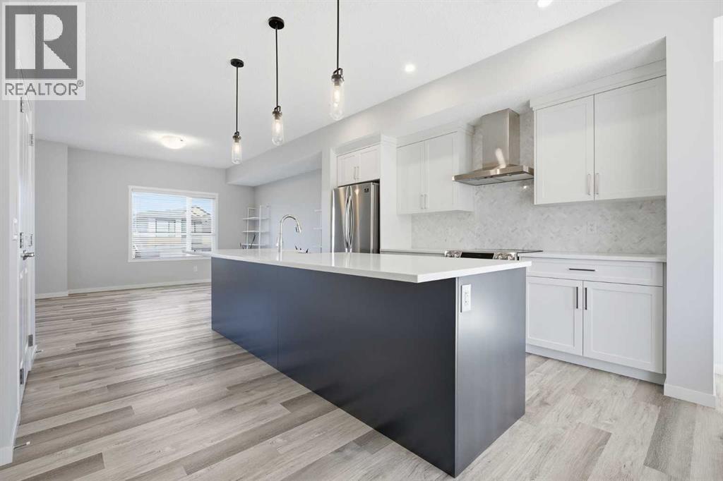 320 Harvest Hills Way NE, Calgary, Alberta  T3K 2P3 - Photo 6 - A2305843