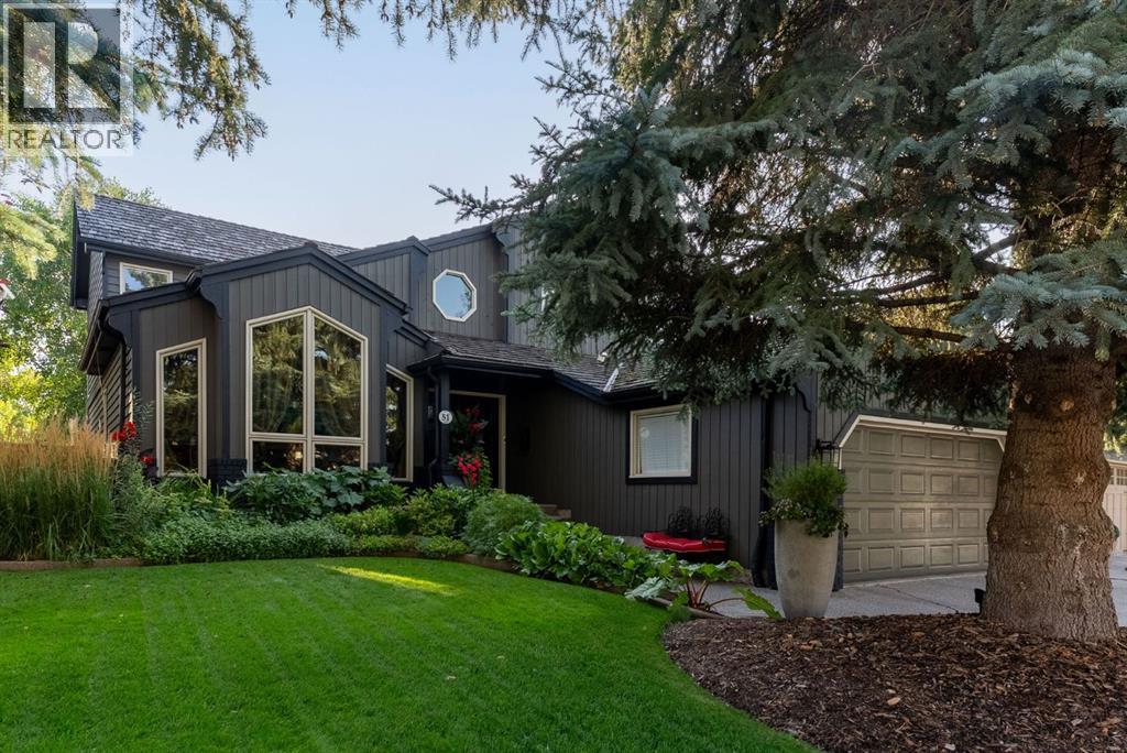 51 Woodridge Close Sw, Calgary, Alberta  T2W 5M2 - Photo 1 - A2313117