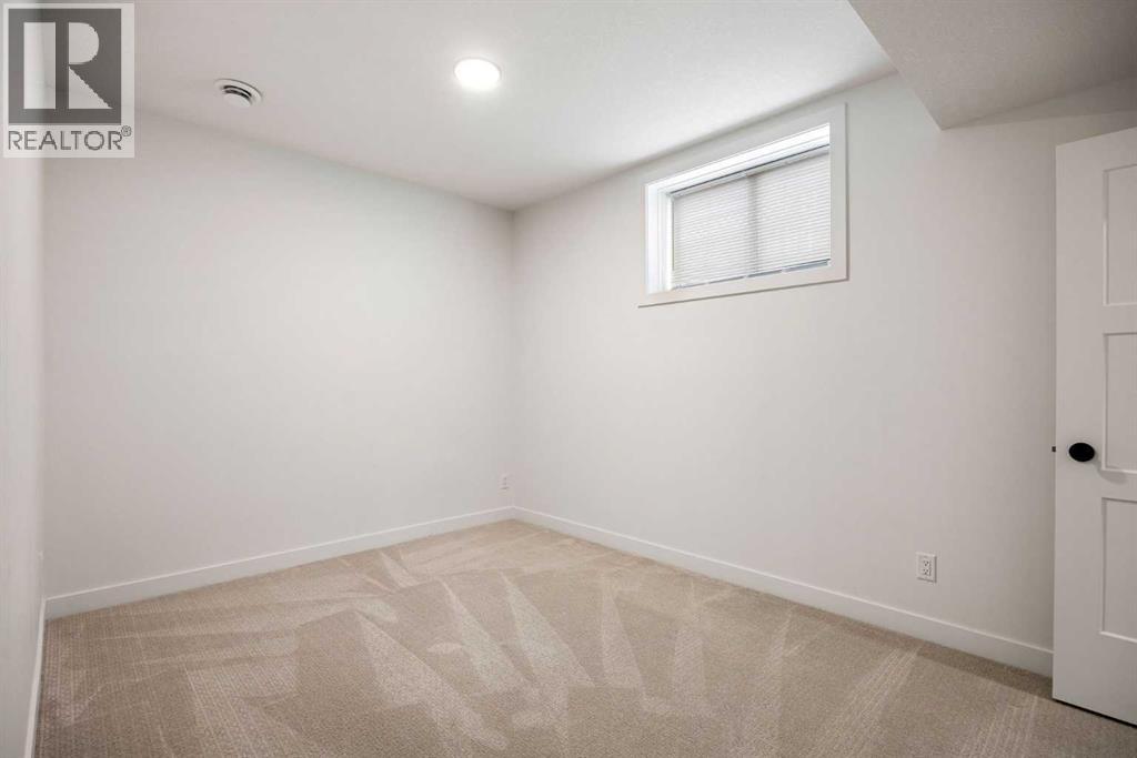 22 Strathridge Court Sw, Calgary, Alberta  T3H 4M2 - Photo 40 - A2313679