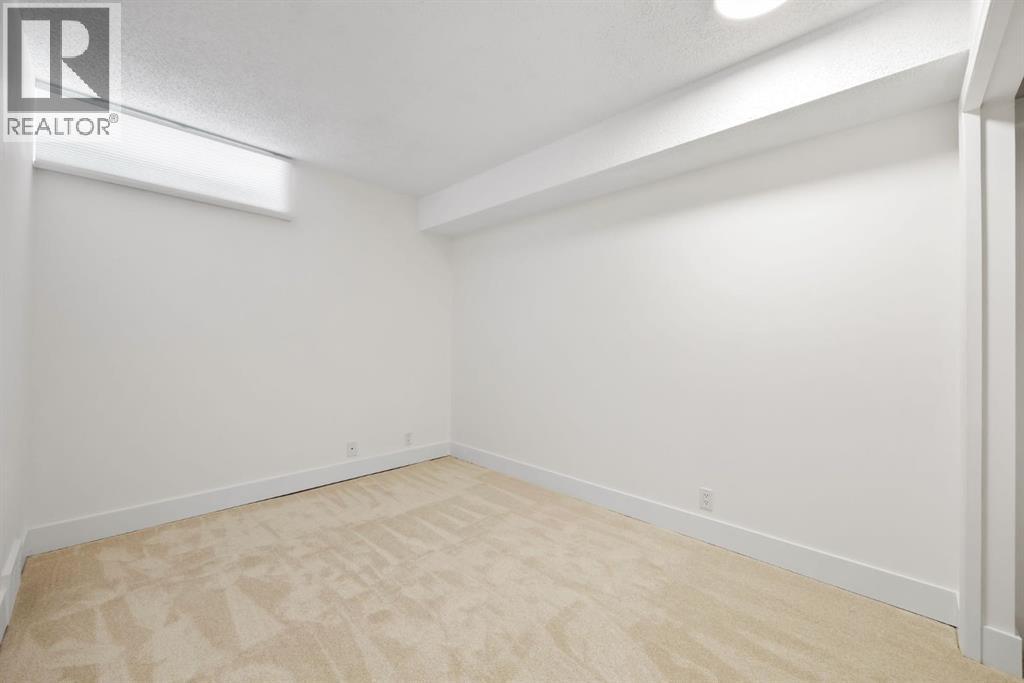 51 Woodridge Close Sw, Calgary, Alberta  T2W 5M2 - Photo 36 - A2313117