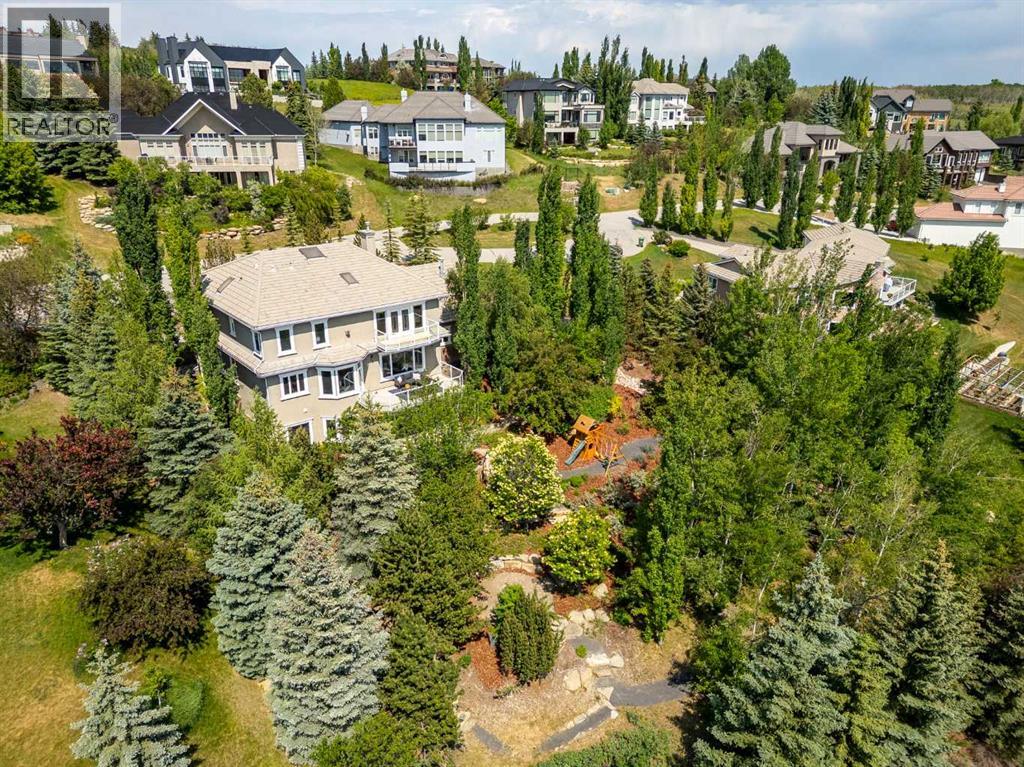 57 Slopes Point Sw, Calgary, Alberta  T3H 3Y8 - Photo 2 - A2278913