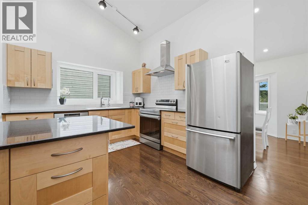84 Coach Gate Way SW, Calgary, Alberta T3H 1Z7 - Photo 12 - A2316162