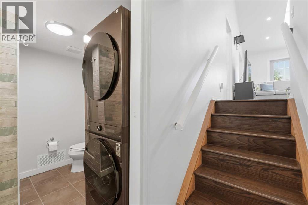 84 Coach Gate Way SW, Calgary, Alberta T3H 1Z7 - Photo 24 - A2316162