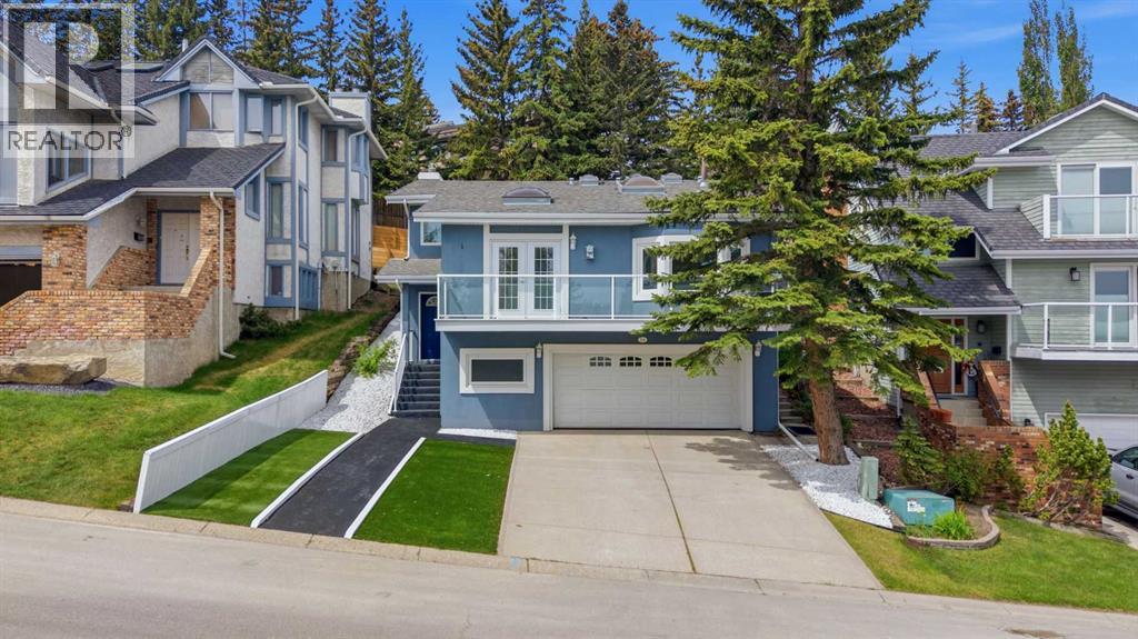84 Coach Gate Way SW, Calgary, Alberta T3H 1Z7 - Photo 1 - A2316162