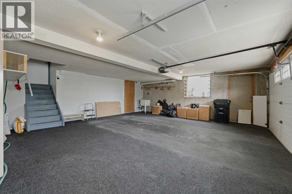 84 Coach Gate Way SW, Calgary, Alberta T3H 1Z7 - Photo 32 - A2316162