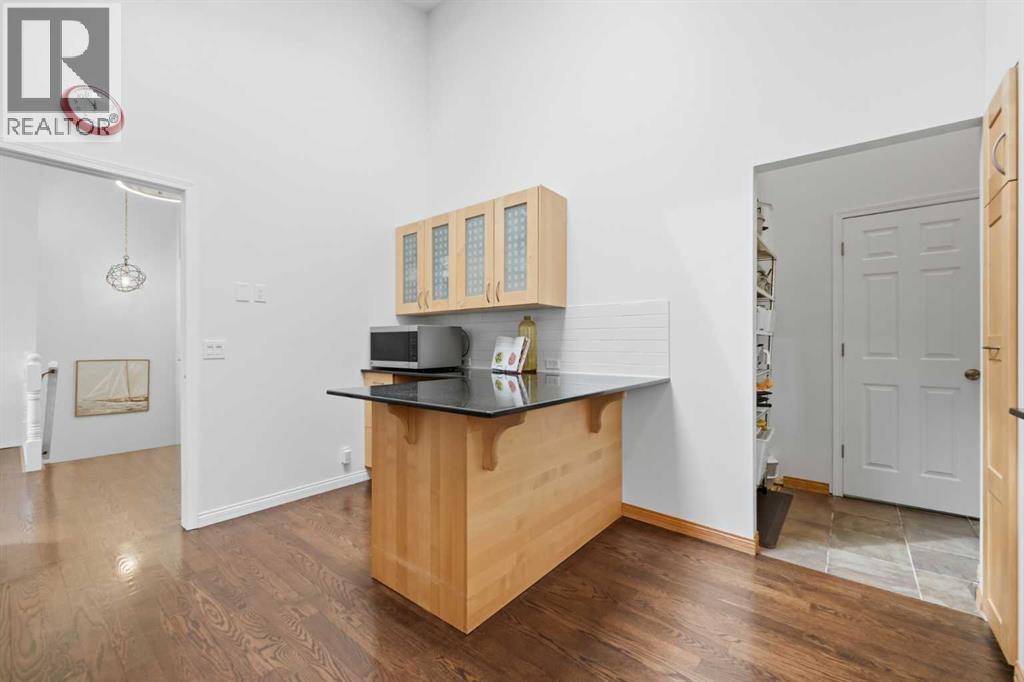 84 Coach Gate Way SW, Calgary, Alberta T3H 1Z7 - Photo 9 - A2316162