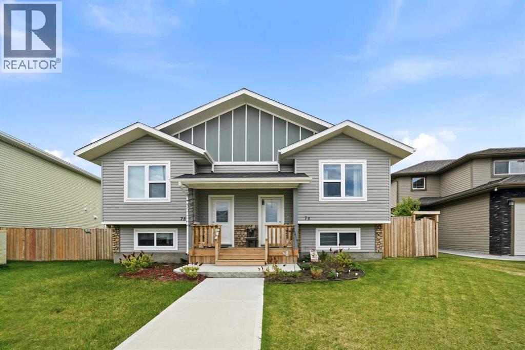 74 Ranchers Close, Lacombe, Alberta  T4L 1E9 - Photo 1 - A2314681