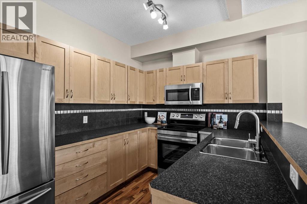 1210, 211 Aspen Stone Boulevard Sw, Calgary, Alberta T3H 0K1 - Photo 7 - A2315710