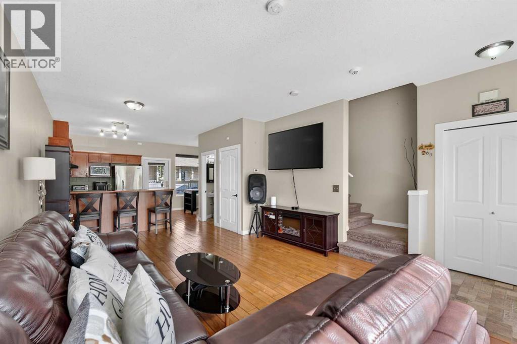 402, 2005 Luxstone Boulevard Sw, Airdrie, Alberta  T4B 3J9 - Photo 3 - A2309648