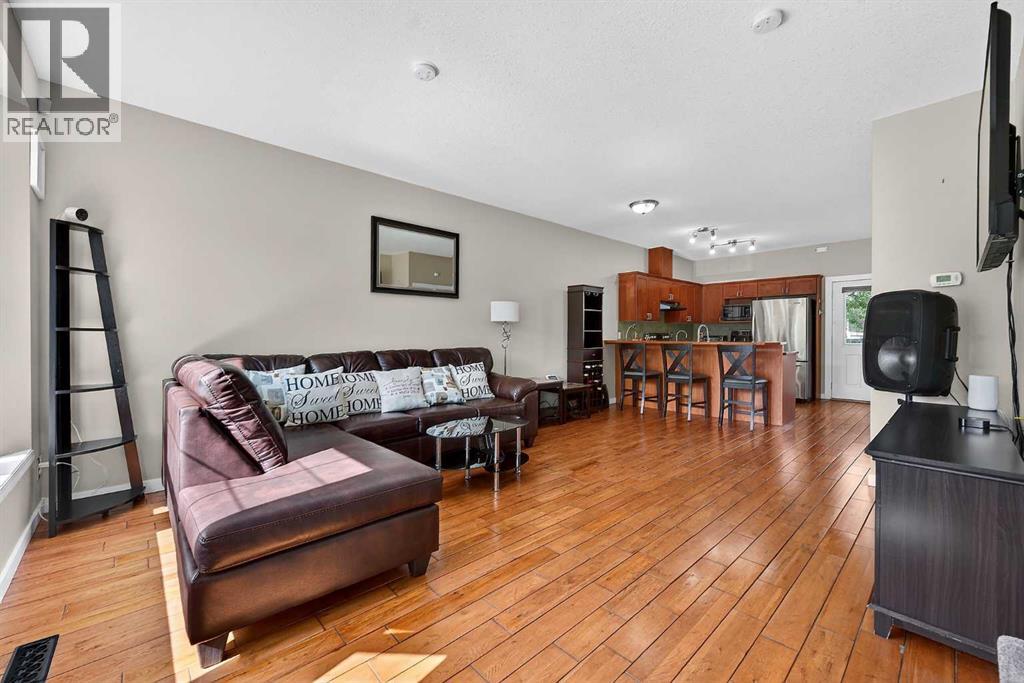 402, 2005 Luxstone Boulevard Sw, Airdrie, Alberta  T4B 3J9 - Photo 2 - A2309648