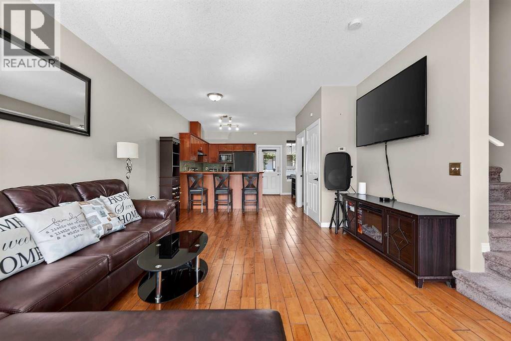 402, 2005 Luxstone Boulevard Sw, Airdrie, Alberta  T4B 3J9 - Photo 1 - A2309648