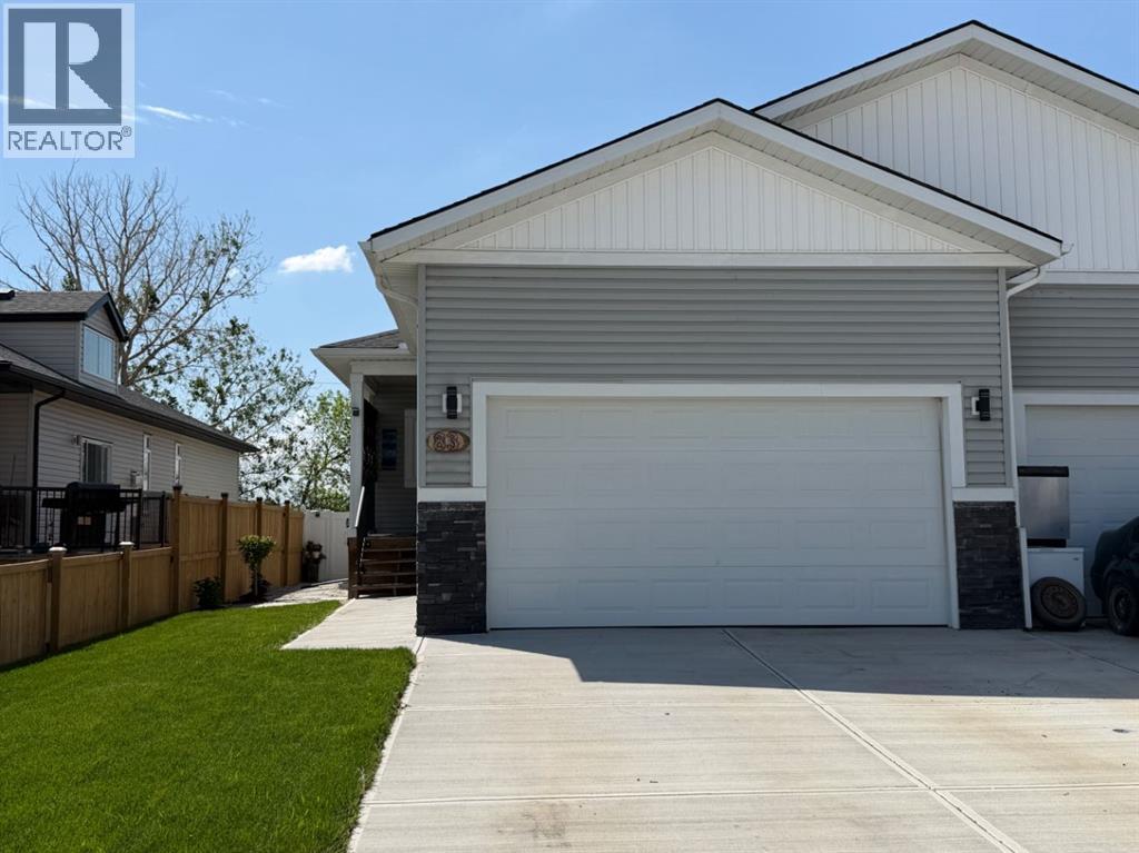 83 Harvest Square, Claresholm, Alberta  T0L 0T0 - Photo 1 - A2315150