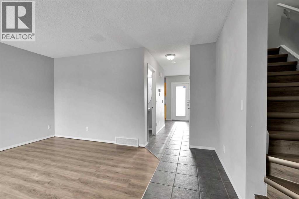164 Bridleridge Gardens Sw, Calgary, Alberta  T2Y 4L4 - Photo 5 - A2314223
