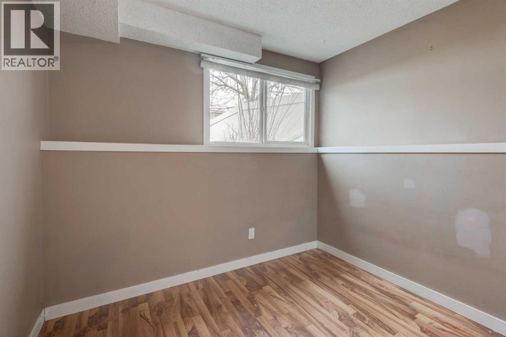 11452 8 Street Sw, Calgary, Alberta  T2W 4J5 - Photo 20 - A2289821