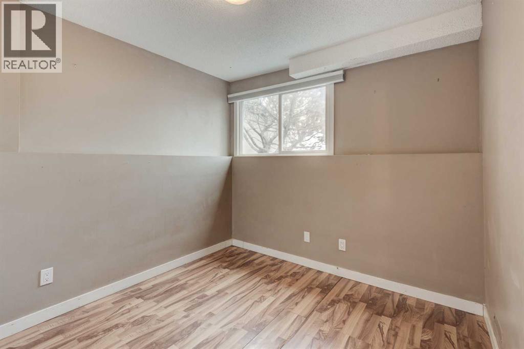 11452 8 Street Sw, Calgary, Alberta  T2W 4J5 - Photo 22 - A2289821