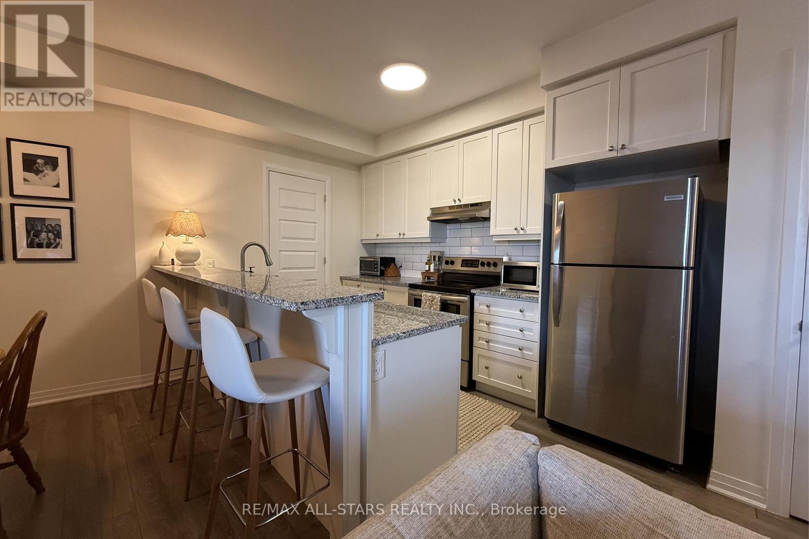 418 - 58 Adam Sellers Street, Markham, Ontario  L6B 1P5 - Photo 2 - N13217578