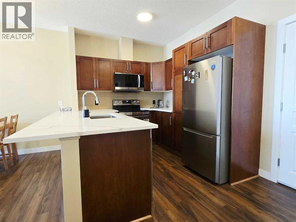 301, 76 Panatella Road Nw, Calgary, Alberta  T3K 0V4 - Photo 2 - A2311845