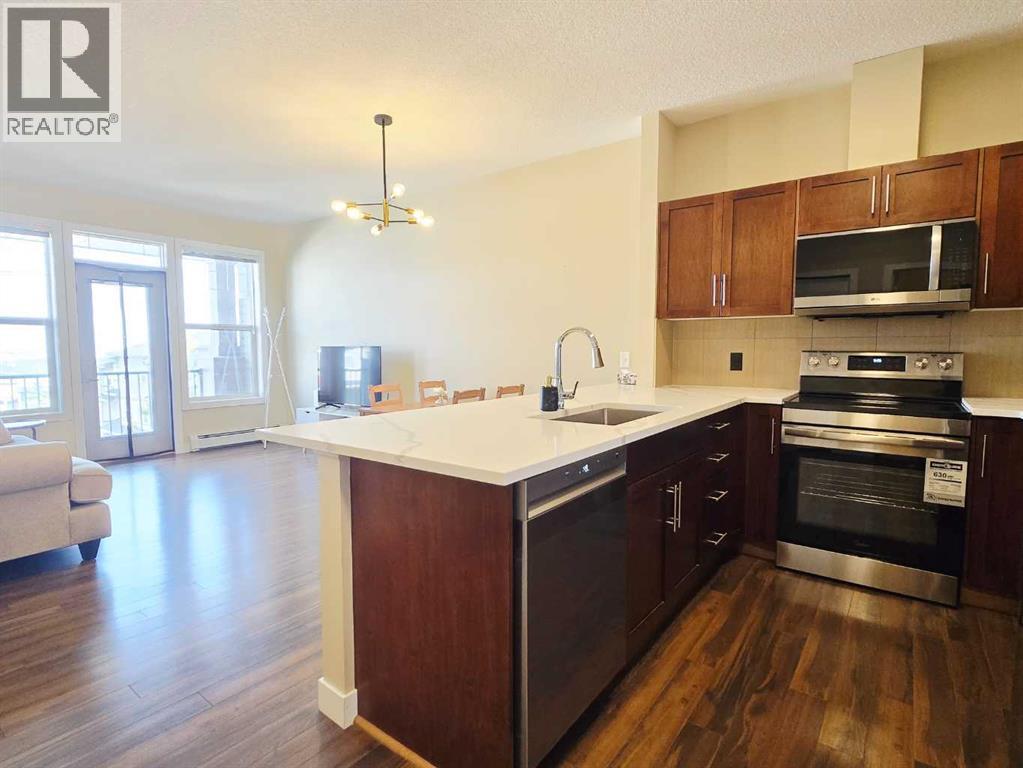 301, 76 Panatella Road Nw, Calgary, Alberta  T3K 0V4 - Photo 3 - A2311845