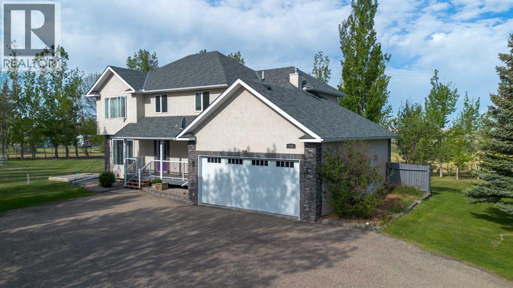 338 Deer Run Place W, Rural Lethbridge County, Alberta  T1J 5R8 - Photo 2 - A2301852