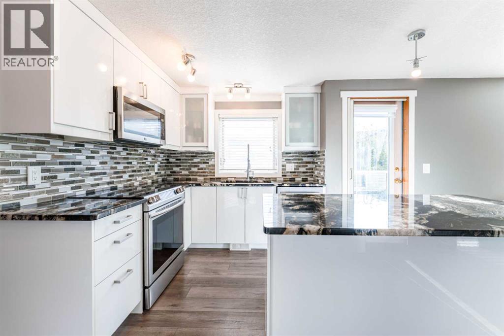 145 Hawkdale Circle NW, Calgary, Alberta  T3G 2W9 - Photo 11 - A2316144