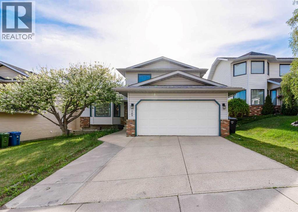 145 Hawkdale Circle NW, Calgary, Alberta  T3G 2W9 - Photo 1 - A2316144