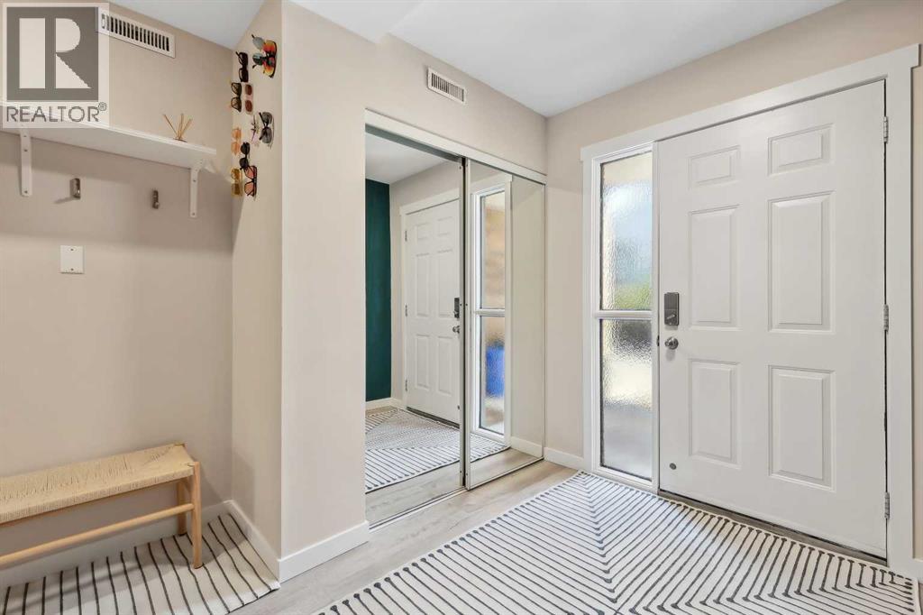 109 Coachway Lane SW, Calgary, Alberta  T3H 2V9 - Photo 4 - A2316179