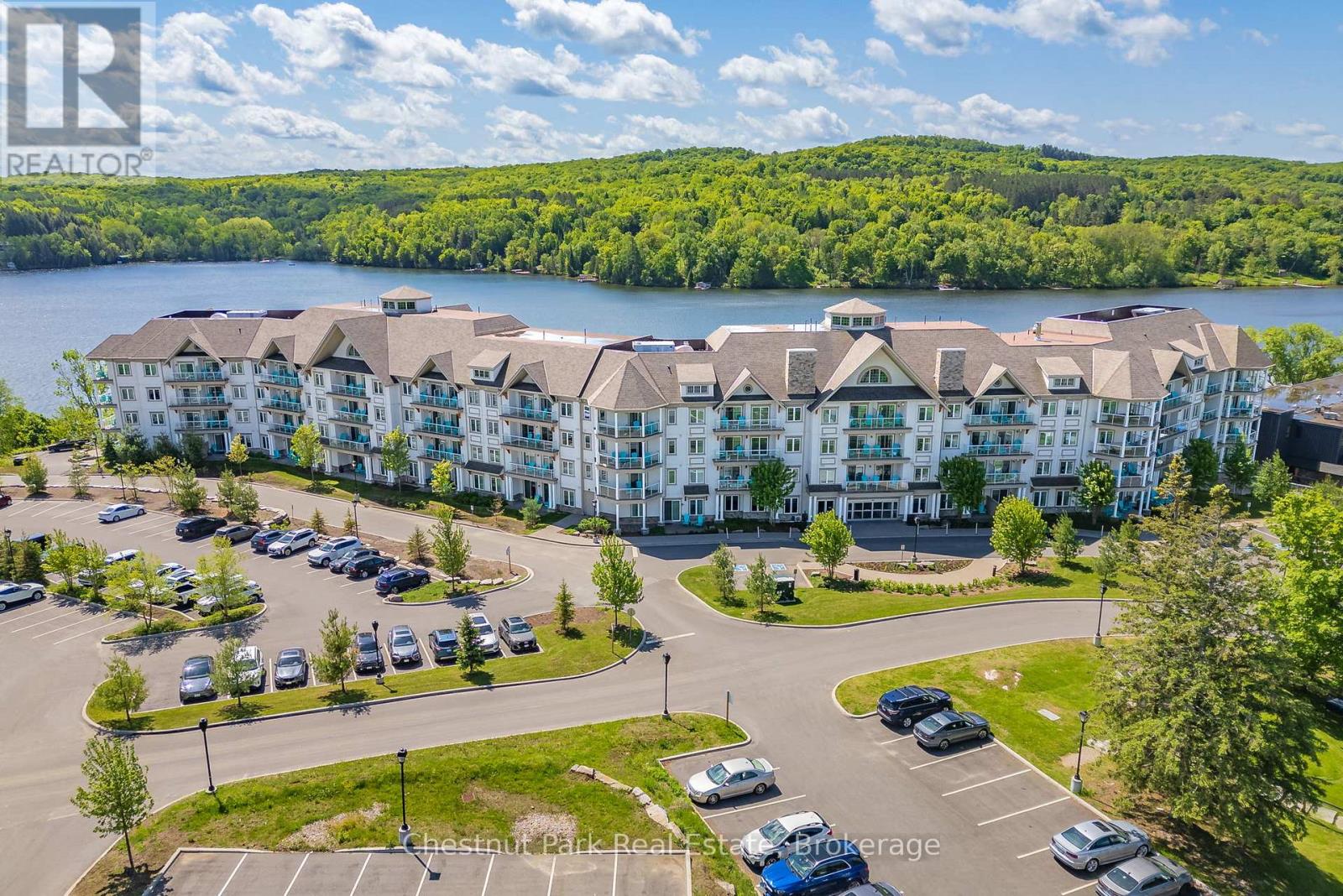 206 - 25 Pen Lake Point Road, Huntsville, Ontario  P1H 1A9 - Photo 1 - X12965954