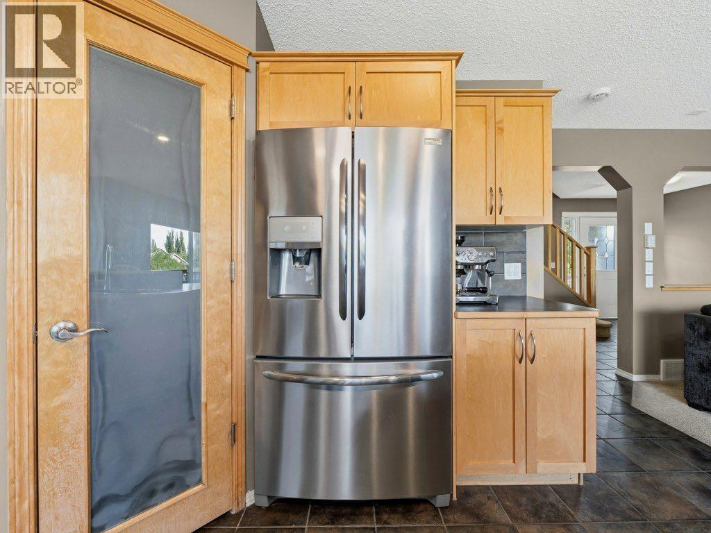 23 Tuscany Ravine View Nw, Calgary, Alberta  T3L 2T1 - Photo 7 - A2316054