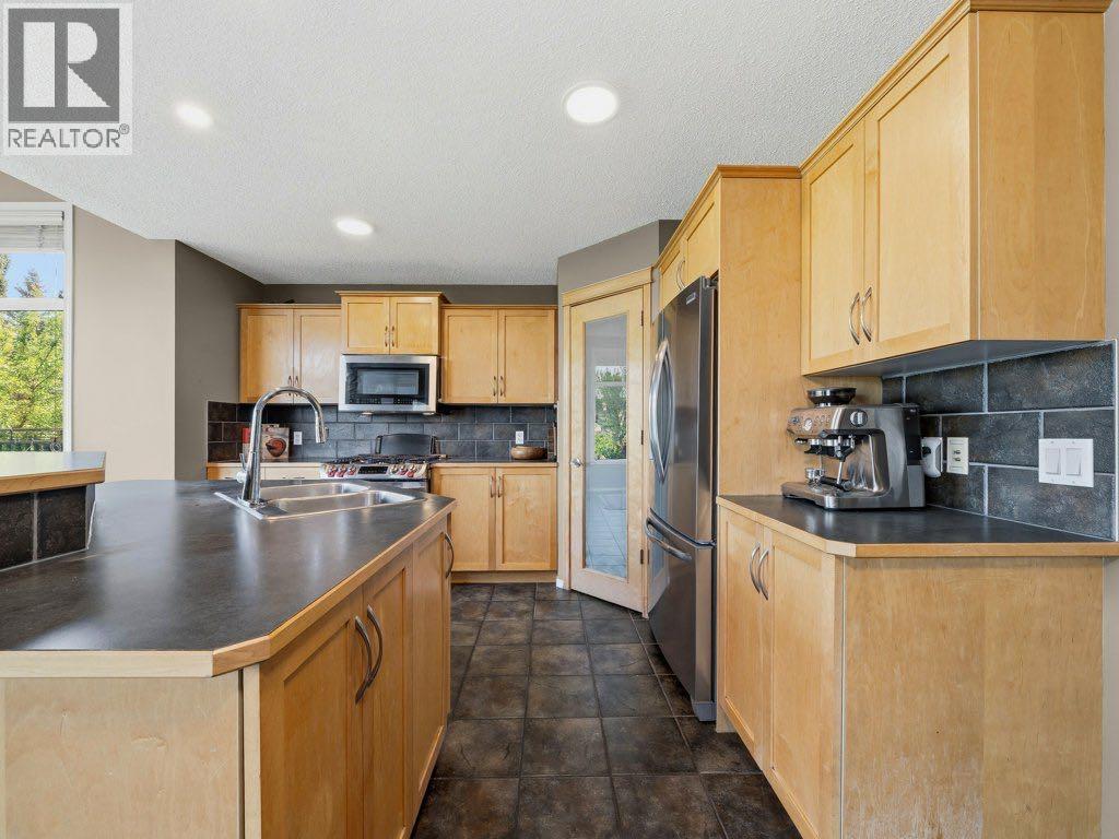 23 Tuscany Ravine View Nw, Calgary, Alberta  T3L 2T1 - Photo 5 - A2316054