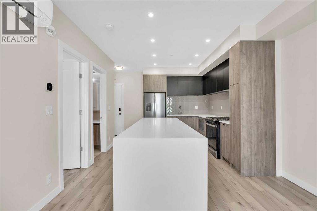 310, 4160 Norford Avenue NW, Calgary, Alberta  T3B 6L8 - Photo 8 - A2301585