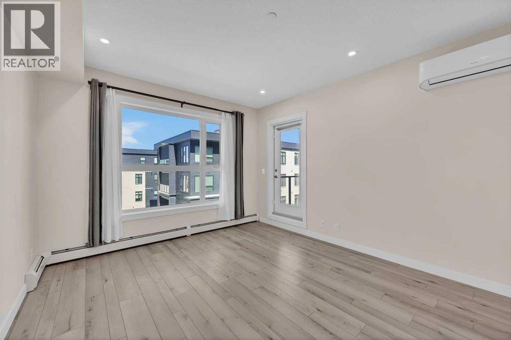 310, 4160 Norford Avenue NW, Calgary, Alberta  T3B 6L8 - Photo 12 - A2301585