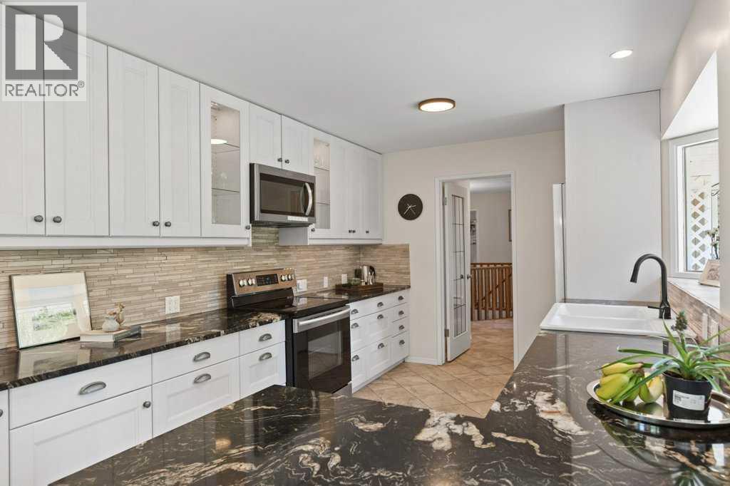 244098 Panorama Ridge Sw, Rural Rocky View County, Alberta  T3Z 3L6 - Photo 8 - A2314459