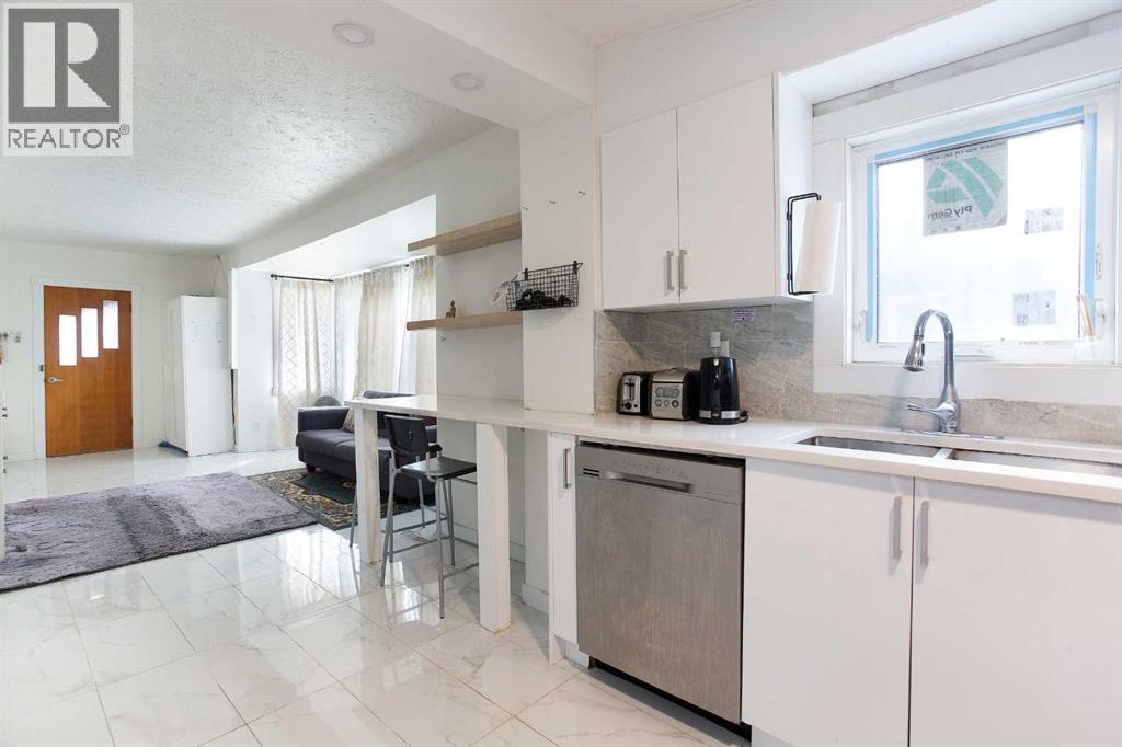7421 21a Street Se, Calgary, Alberta  T2C 0W1 - Photo 6 - A2306971