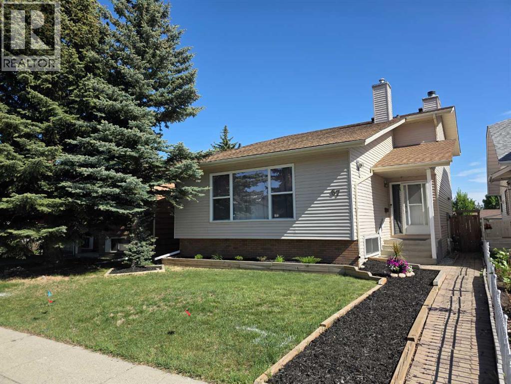 67 Deersaxon Circle SE, Calgary, Alberta  T2J 6R5 - Photo 1 - A2315775