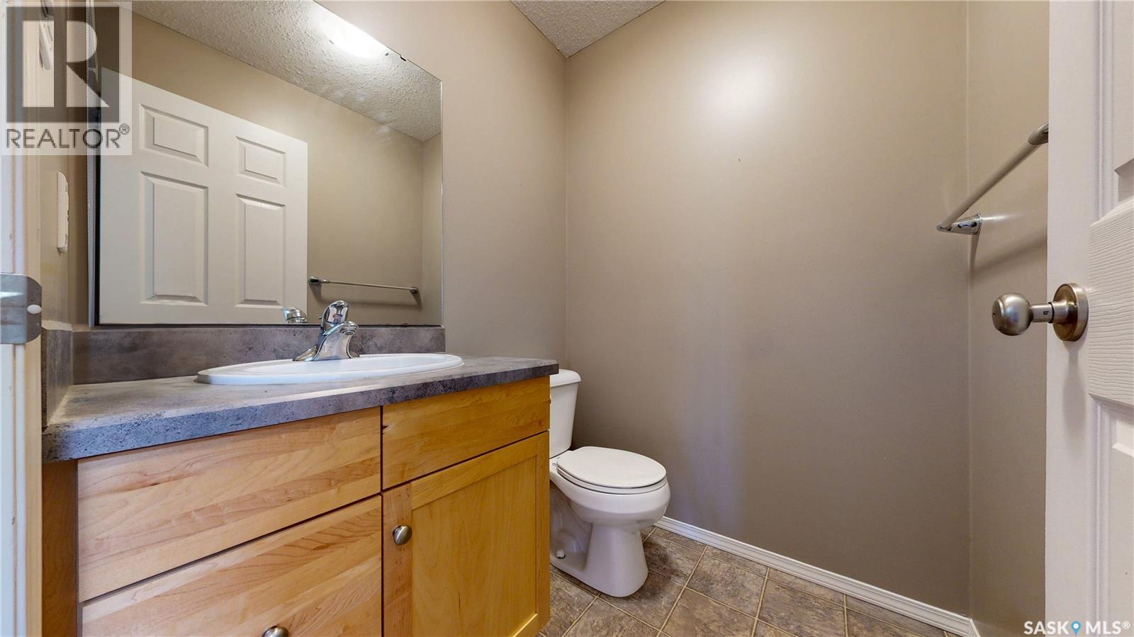 7058 Wascana Cove Drive, Regina, Saskatchewan  S4V 3E9 - Photo 5 - SK037543