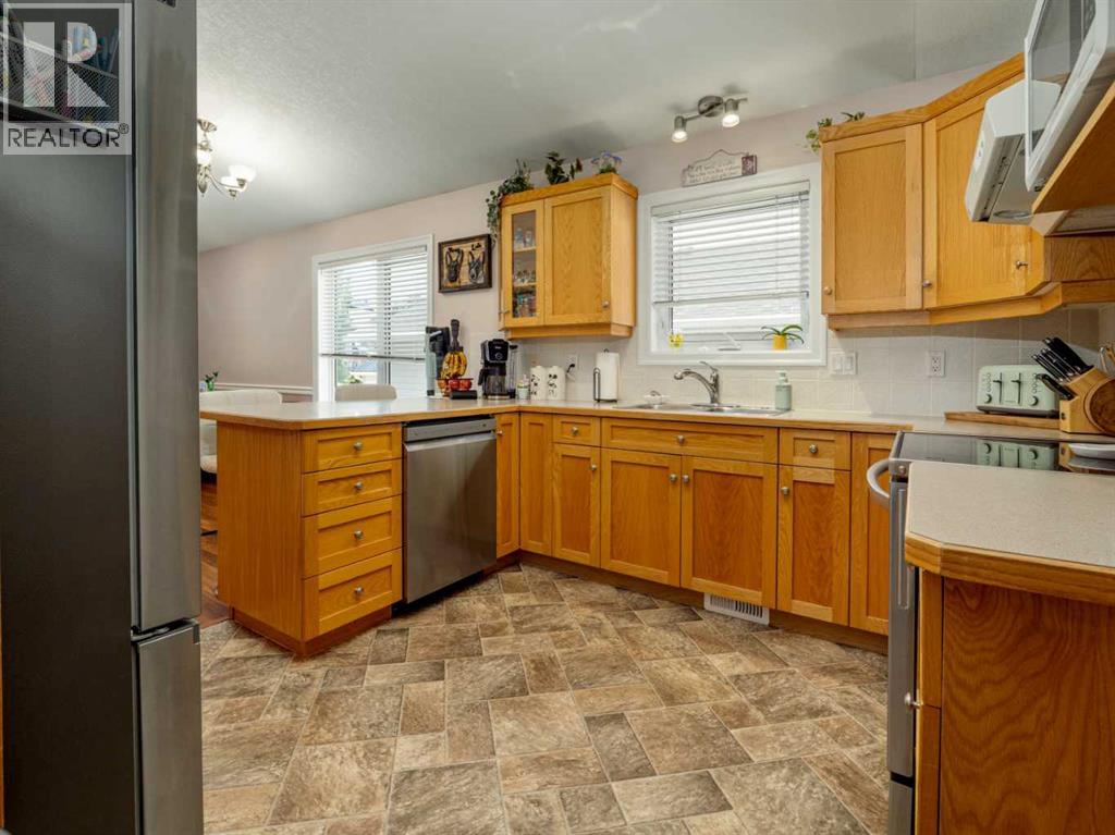 76 Blackfoot Crescent W, Lethbridge, Alberta  T1K 7P7 - Photo 7 - A2314861