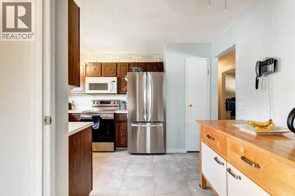 495 Queen Charlotte Road Se, Calgary, Alberta  T2J 5H8 - Photo 9 - A2316139
