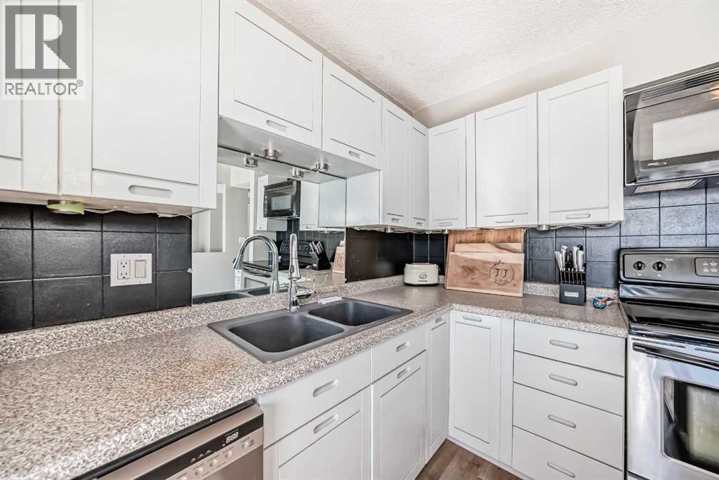 208, 1305 Glenmore Trail SW, Calgary, Alberta  T2V 4Y8 - Photo 6 - A2316337