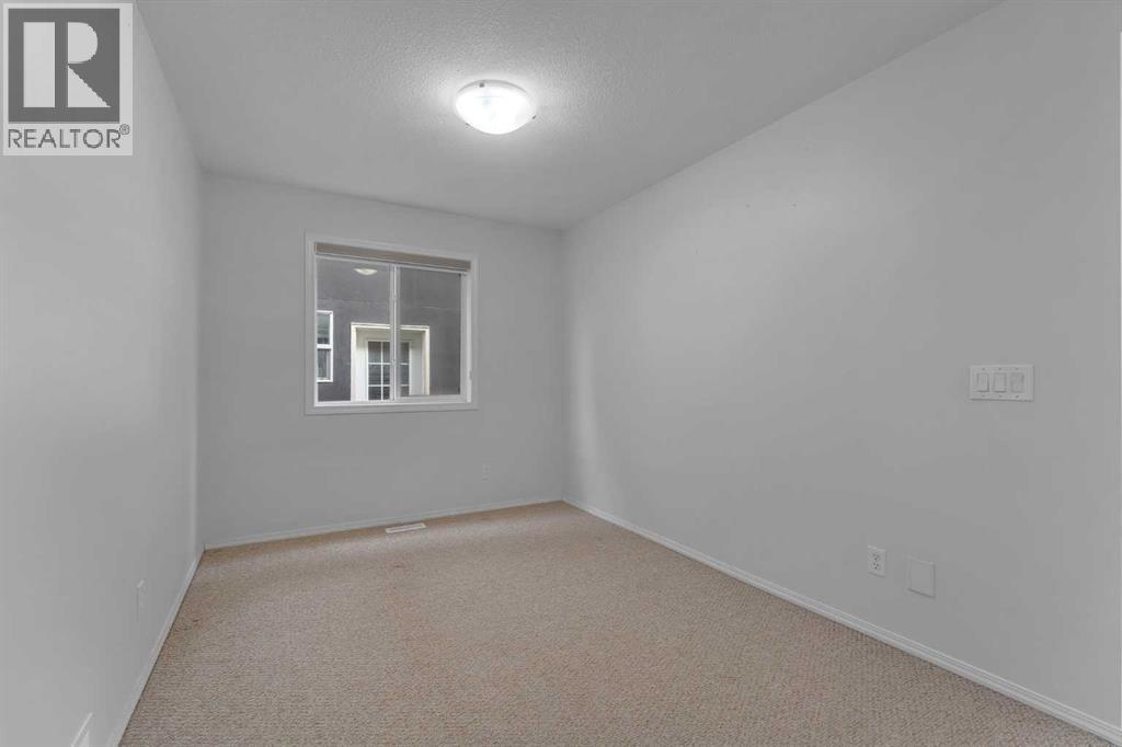 33 Saddlecrest Crescent Ne, Calgary, Alberta  T3J 0C6 - Photo 6 - A2306840