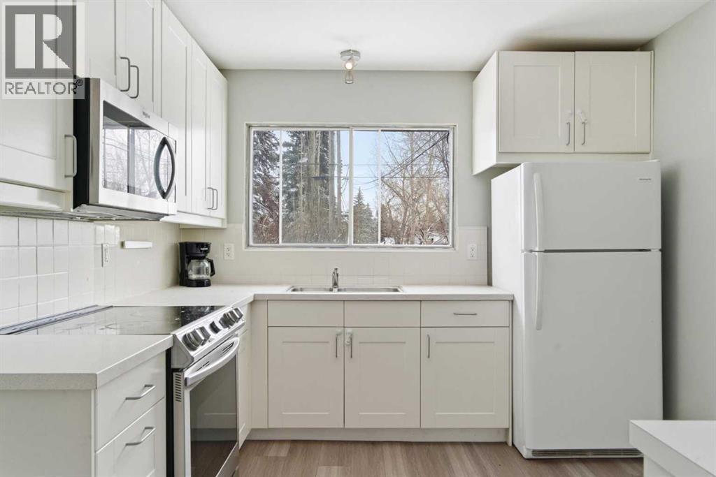 173 Gordon Drive Sw, Calgary, Alberta T3E 5B1 - Photo 8 - A2303127