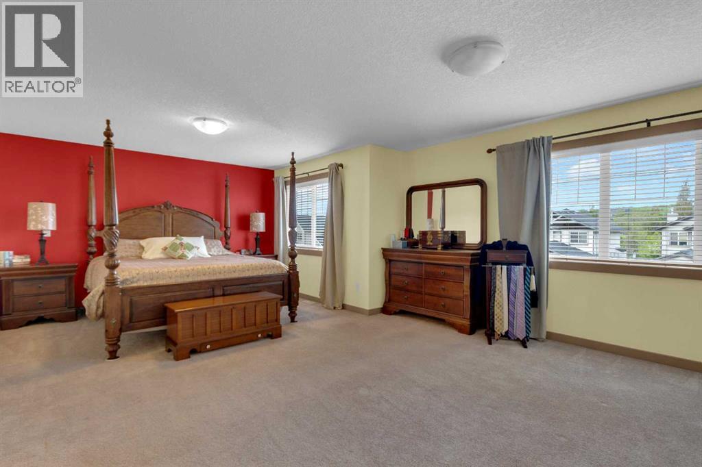 8 Elmont Court SW, Calgary, Alberta  T3H 5Z8 - Photo 23 - A2314670