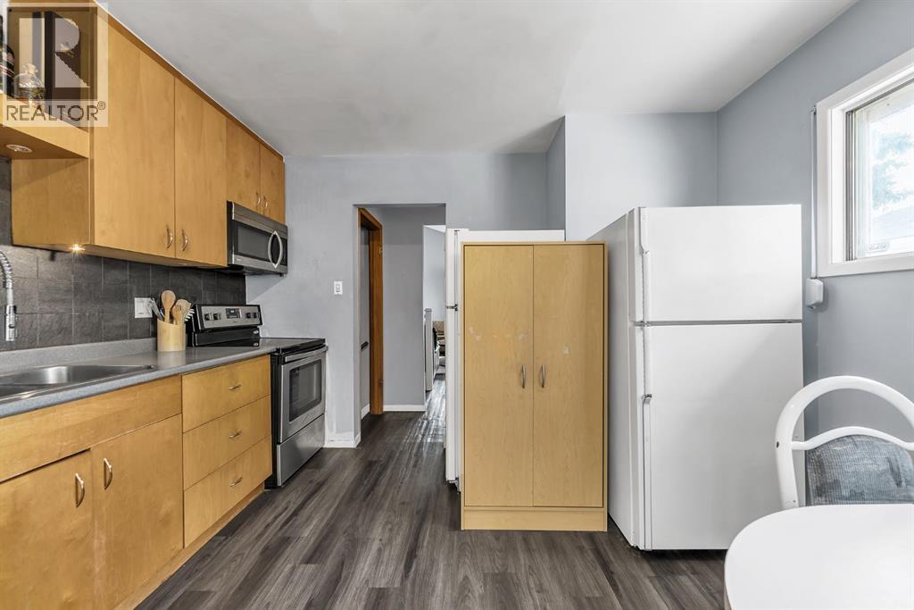3156 Blakiston Drive Nw, Calgary, Alberta  T2L 1L8 - Photo 6 - A2313668