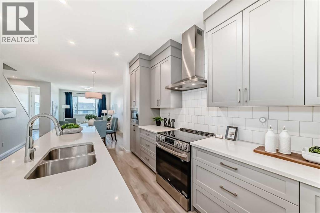 238 Aquila Drive Nw, Calgary, Alberta  T3R 1Y6 - Photo 4 - A2315551