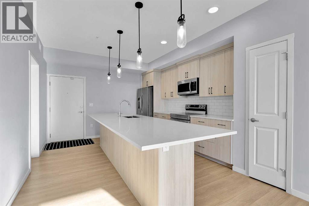 322, 360 Harvest Hills Way NE, Calgary, Alberta  T3K 2S1 - Photo 3 - A2283851