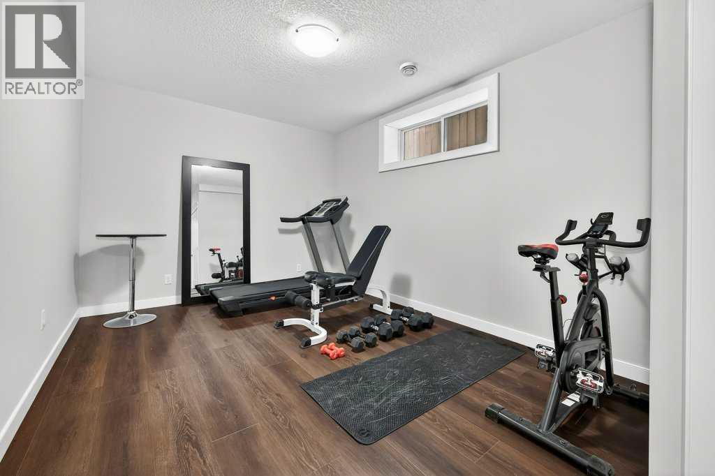 92 Fireside Crescent, Cochrane, Alberta  T4C 2A3 - Photo 28 - A2290318