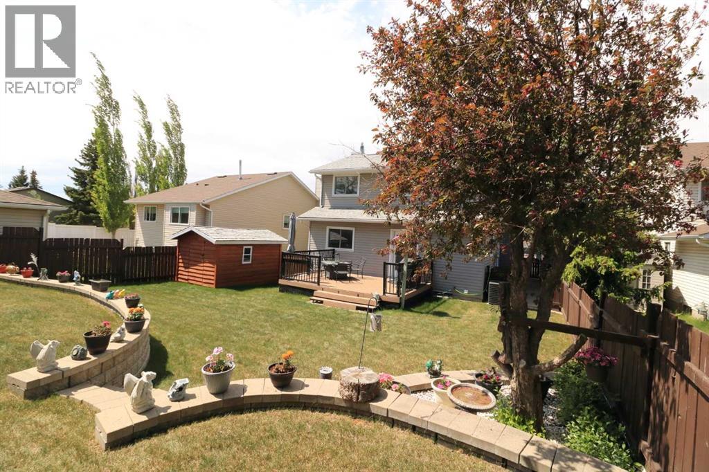 8 Meadow Place Se, Airdrie, Alberta  T4A 1W4 - Photo 1 - A2299404
