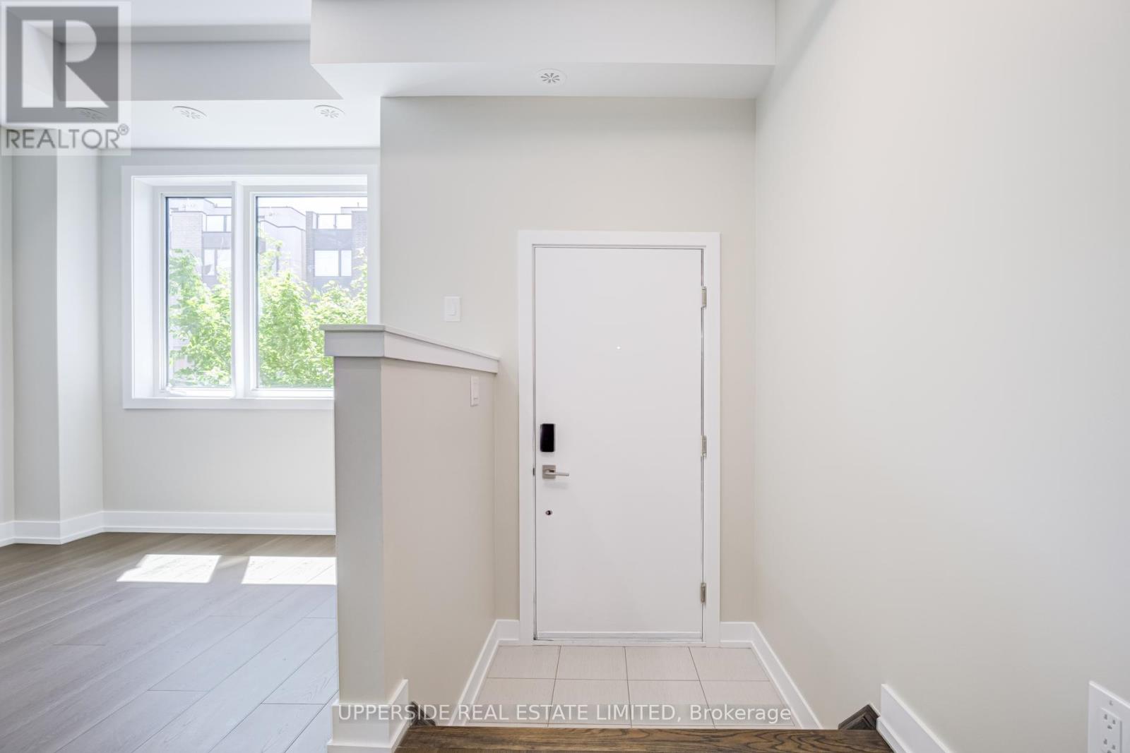 43 Frederick Tisdale Drive, Toronto, Ontario  M3K 2B8 - Photo 2 - W13219652