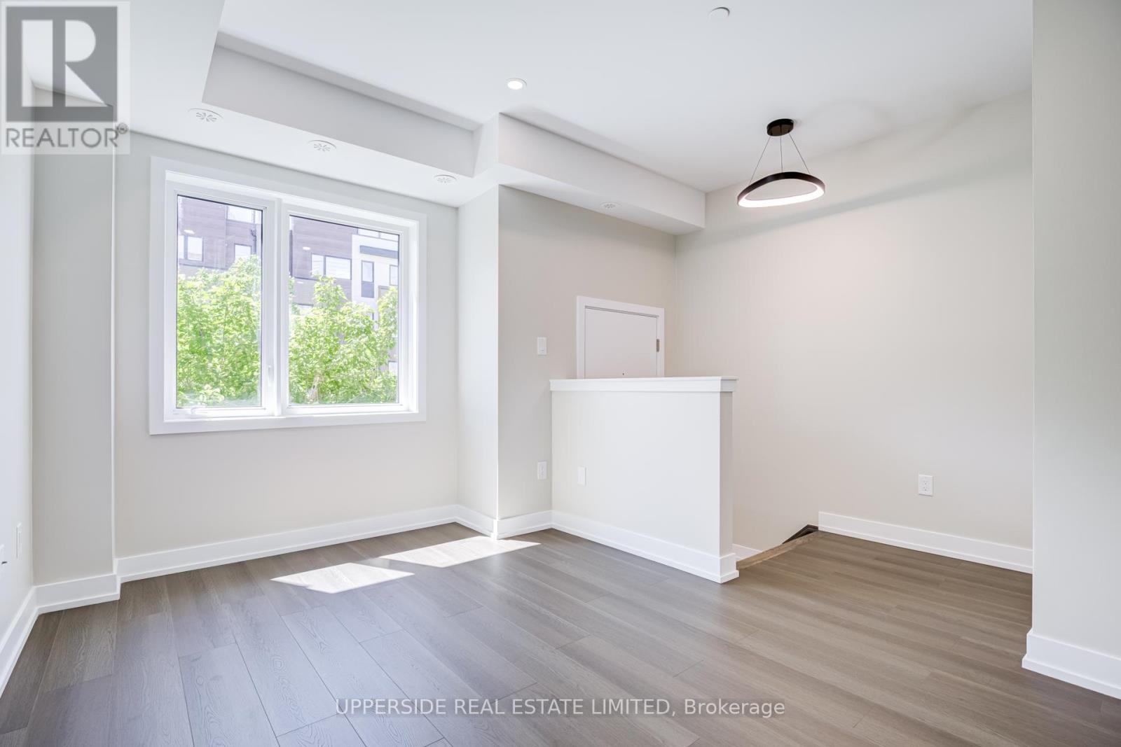 43 Frederick Tisdale Drive, Toronto, Ontario  M3K 2B8 - Photo 4 - W13219652