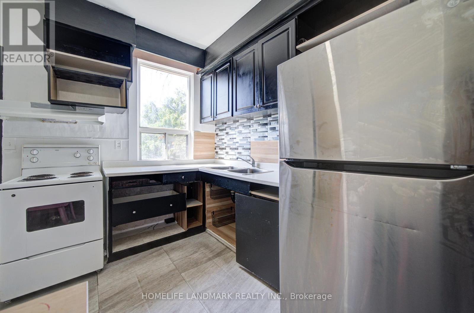 Main & Bsmt - 19 Armstrong Avenue, Toronto, Ontario  M6H 1V9 - Photo 12 - W13144626