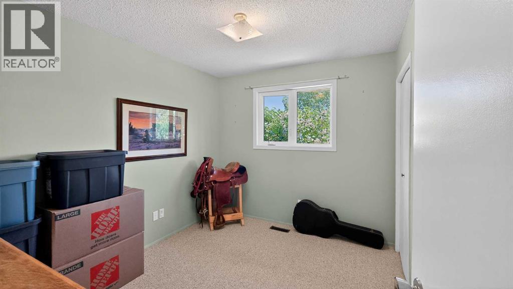 77 Iroquois Crescent W, Lethbridge, Alberta  T1K 5J3 - Photo 19 - A2316274